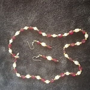 Genuine freshwater pearls from Ucluelet, BC w faux garnets.  Earrings & necklace